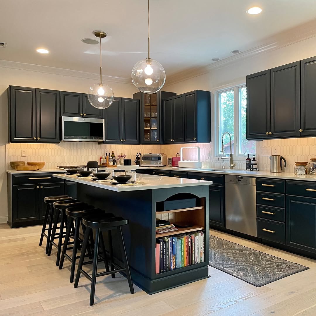 He Spray Painted the Orange Oak Cabinets an Almost-Black Blue and the Kitchen Took on a Custom-Built Look