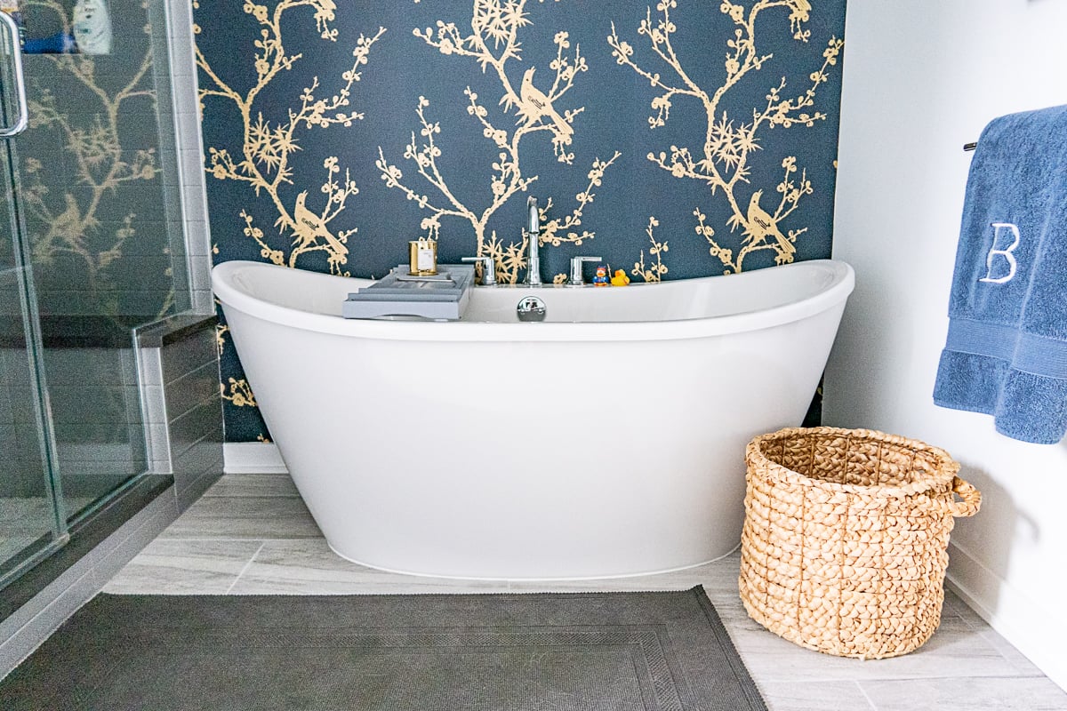 Modern Primary Bathroom Design with Bold Wallpaper