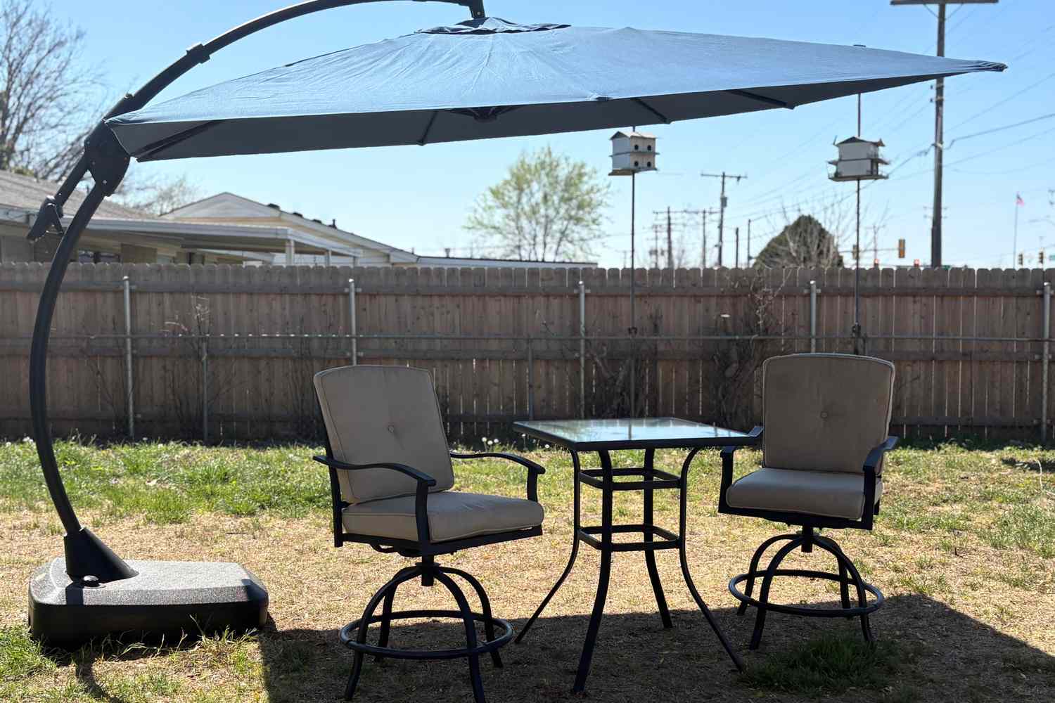 Site Loop: featuring outdoor view and umbrella x Desiree Square Cantilever Sunbrella Umbrella product