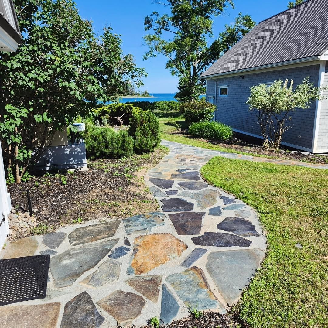 Flagstone Walkways, Patios, and Paths That Bring Structure to Outdoor Spaces