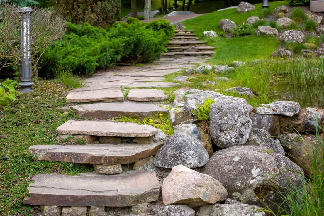 How to Landscape a Sloped Backyard: Mastering the Challenge