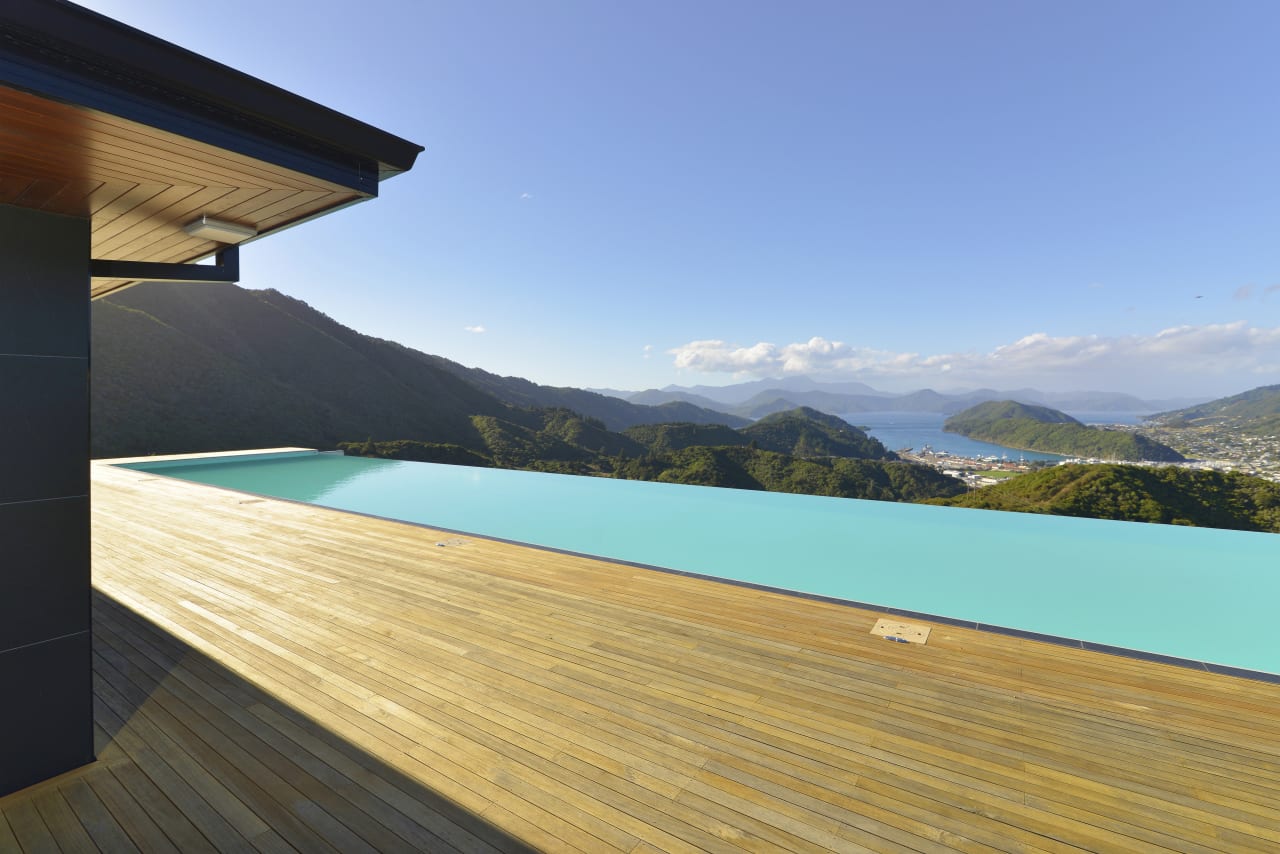 Infinity-edge 25m by 6m fibreglass swimming pool… | Trends