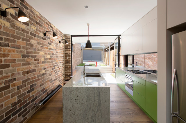 kitchen with New York loft metal door, recycled brick and courtyard beyond. - Industrial - Kitchen - Sydney - by Danny Broe Architect | Houzz AU