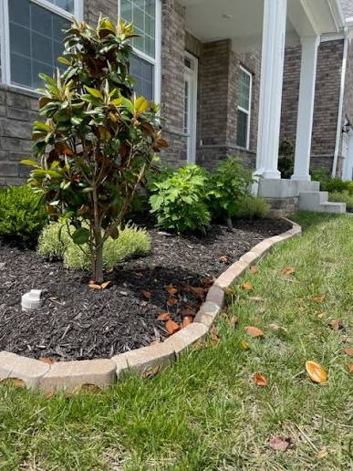 Landscape Design with Stone Edging and Garden Bed | Packard Landscape Co.