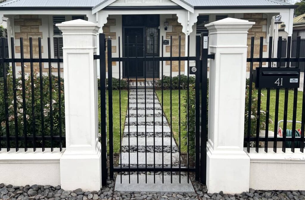 Modern Fence Designs - A Short Concrete Pillar Fence For A New Contemporary Home