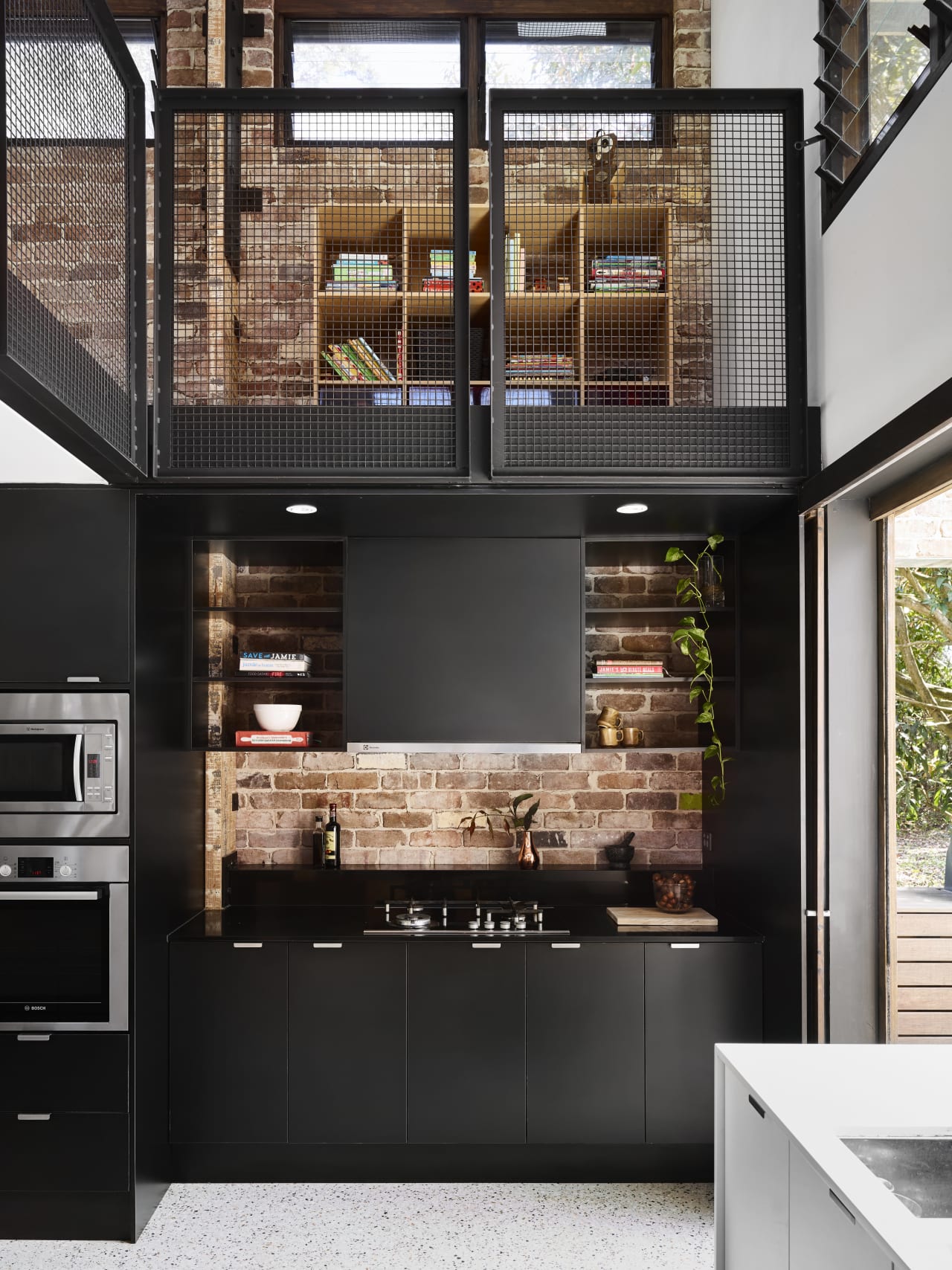 Part of a barn-style addition built with recycled… | Trends