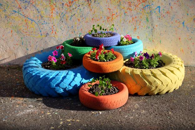 Recycling Used Tires for DIY Planters Making Vibrant Yard Decorations