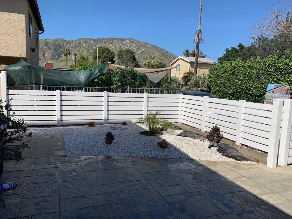 Redefine Your Backyard with Modern Horizontal Vinyl Fences