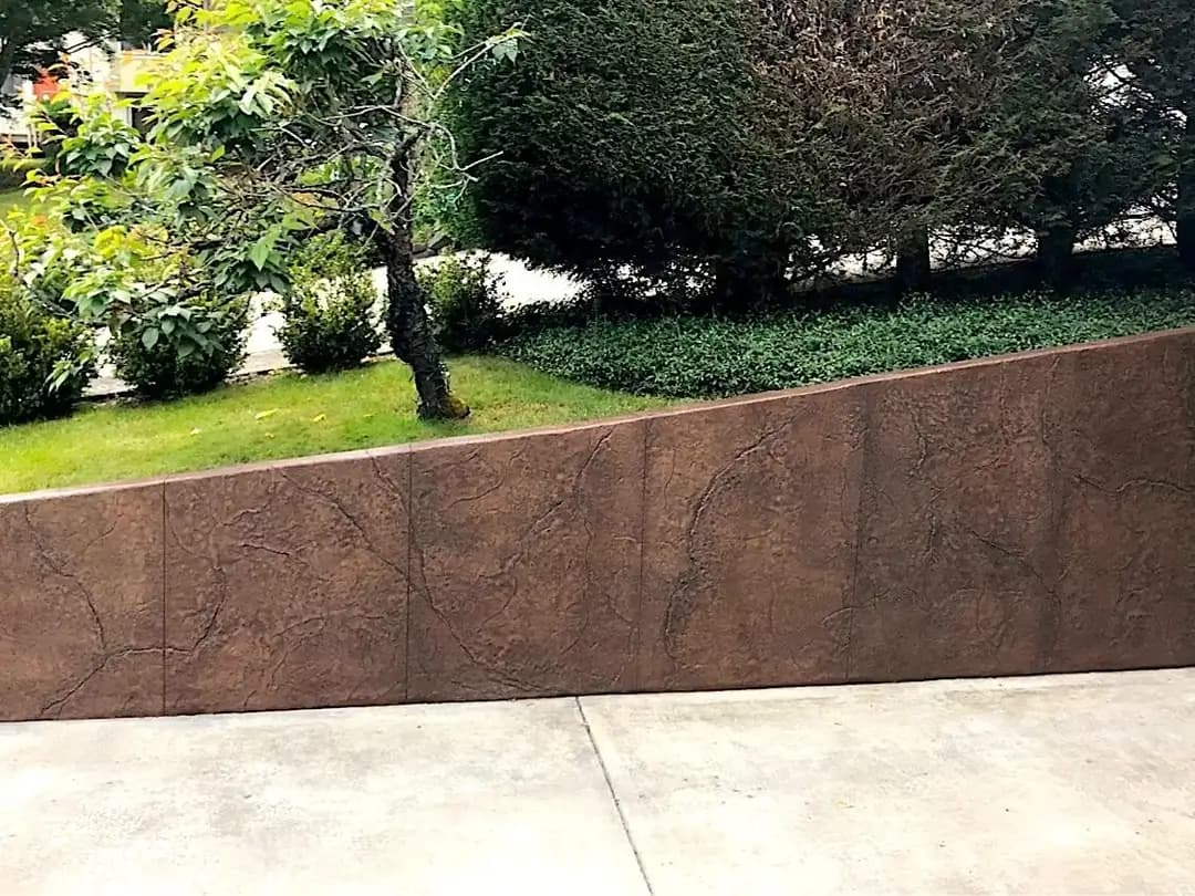 Stamped Concrete Retaining Wall with a Matching Textured Stairway in Tacoma, WA | RC Concrete Projects