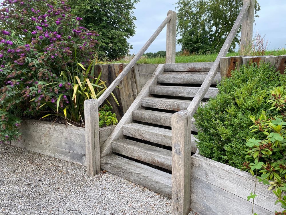 Steps from new oak and used tropical hardwood railway sleepers. Railwaysleepers.com