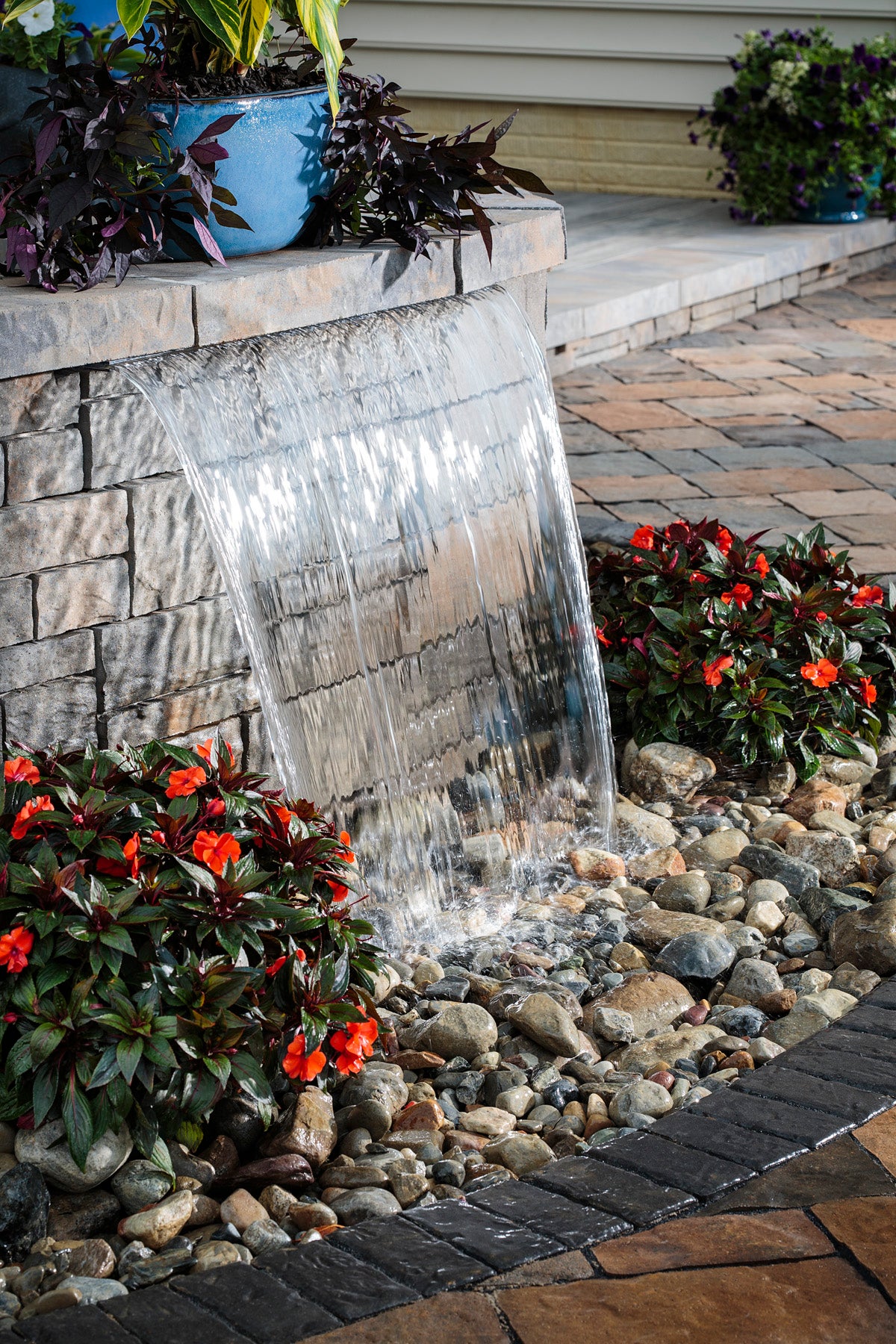 The Latest Trends in Outdoor Water Features for Patios & Pools