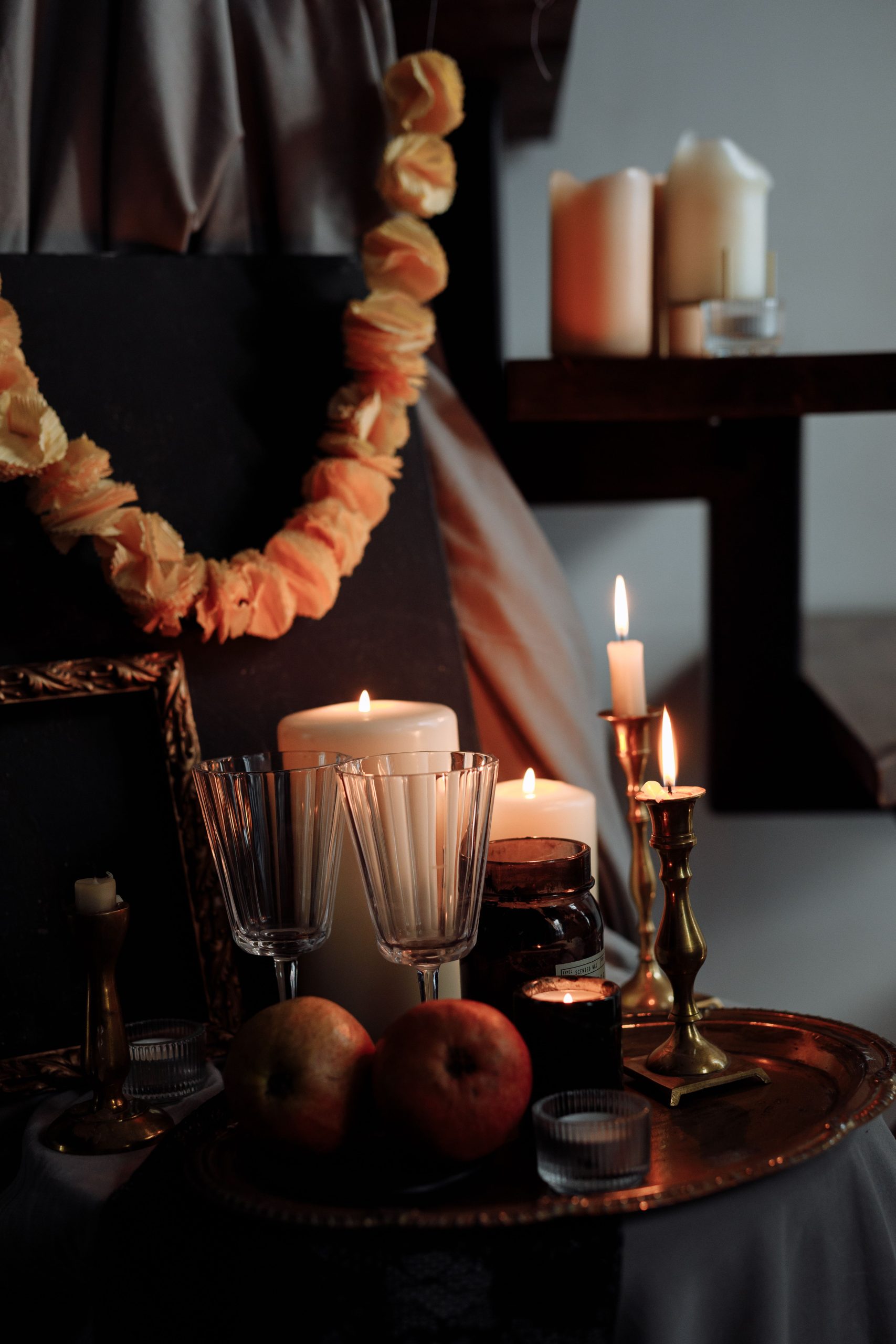 Artistic candlelit scene with autumn accents, perfect for seasonal and cozy settings.