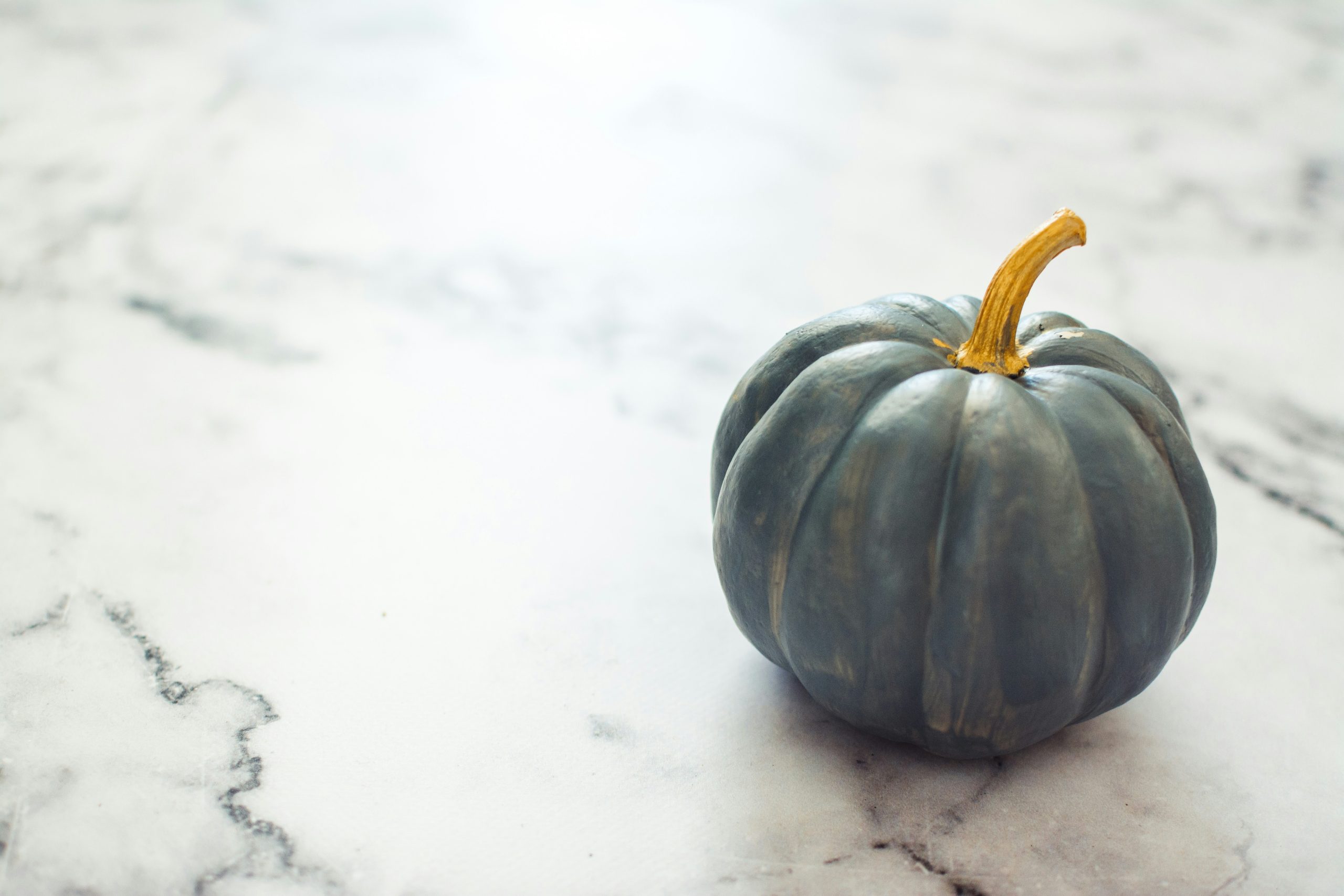 Blue Painted Pumpkin on marble top, Fall, Autumn
