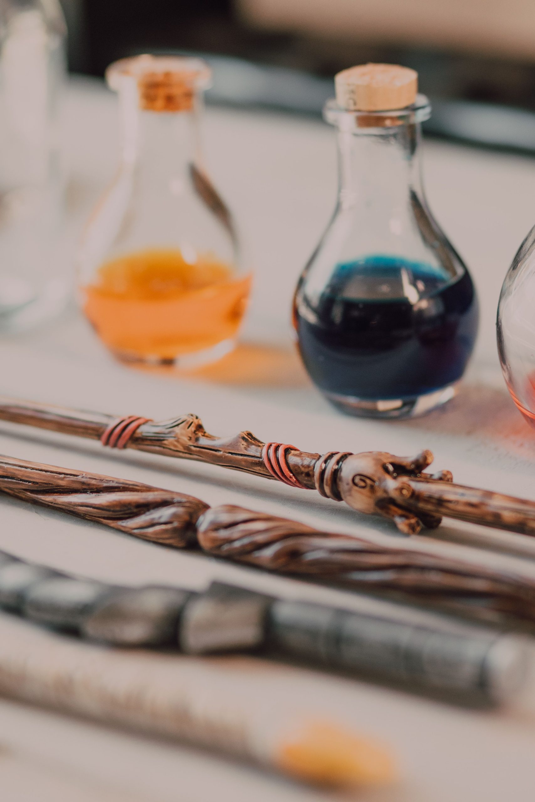 Enchanting scene of wands and potion bottles, capturing the essence of wizarding magic.