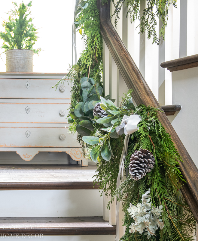 How to Decorate a Staircase With Garland - Sanctuary Home Decor