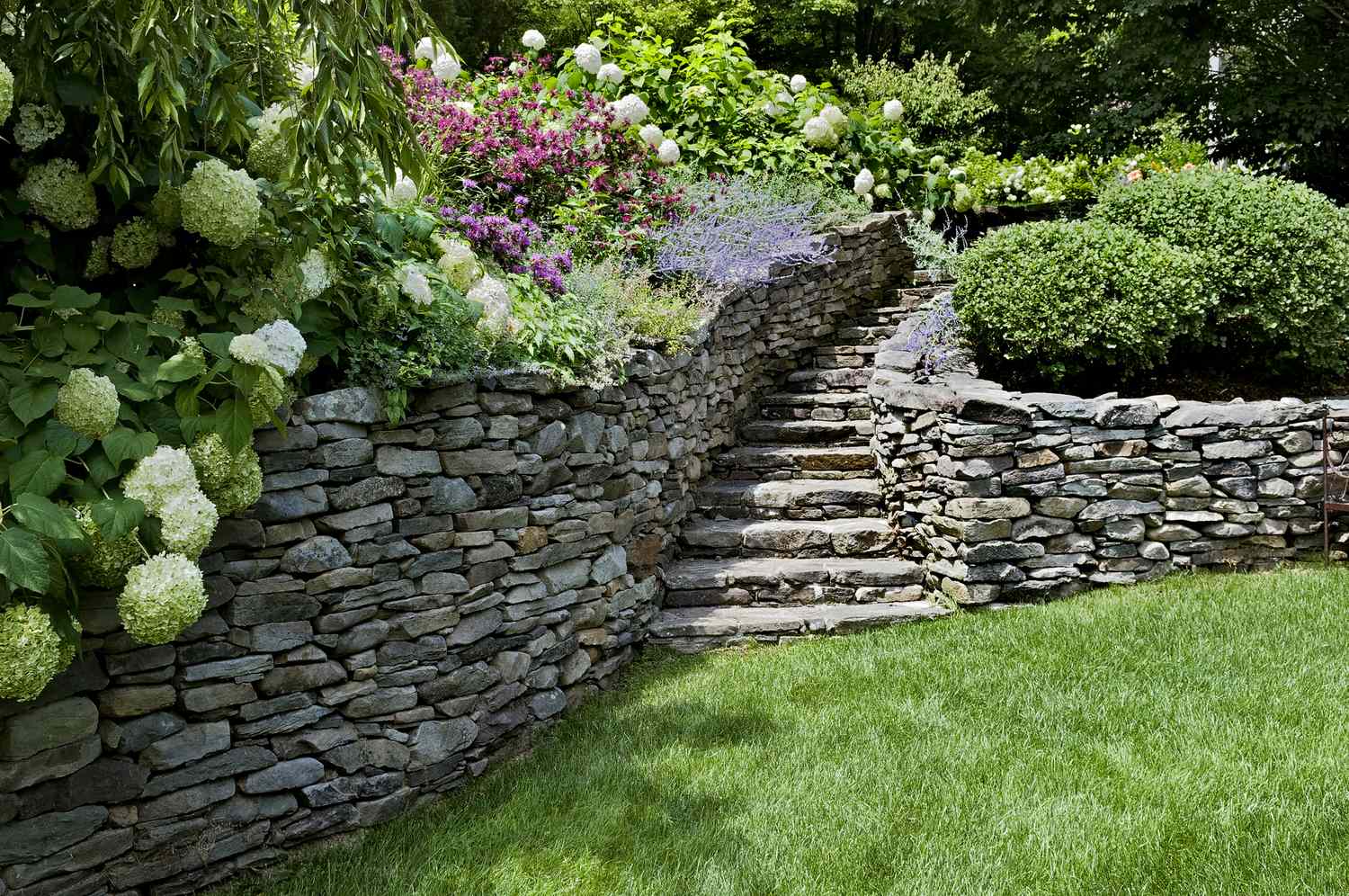 10 Retaining Wall Ideas for a Sloped Backyard