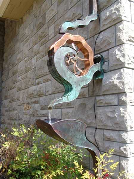 30 Amazing Downspout Ideas, Splash Guards, Charming Rain Chains and Creative Rain Ropes