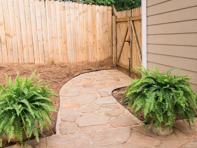 How to Install a Flagstone and Gravel Patio or Pathway | HGTV