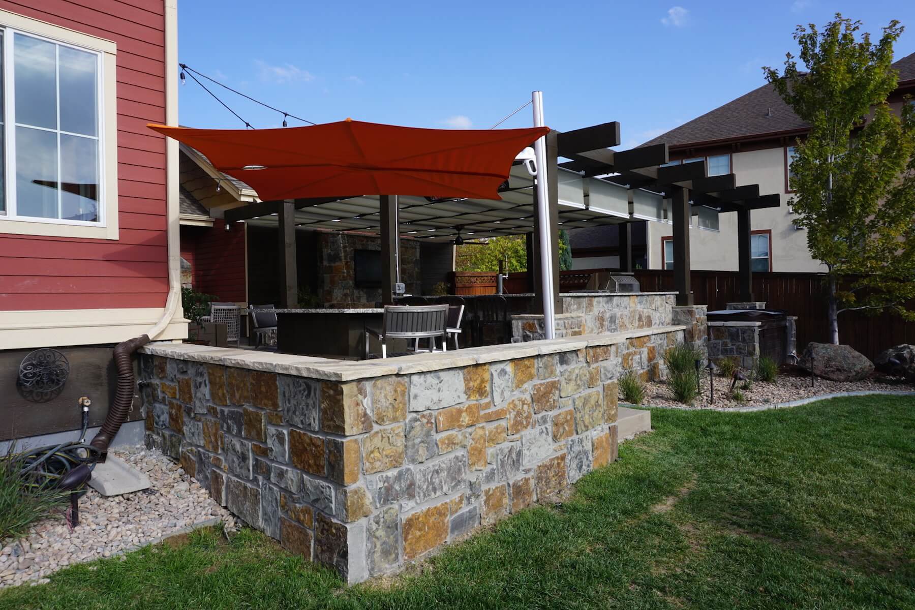Pergola, Outdoor Kitchen, & Stone Patio - Lowry, CO - Landscape Design Build - Denver, CO