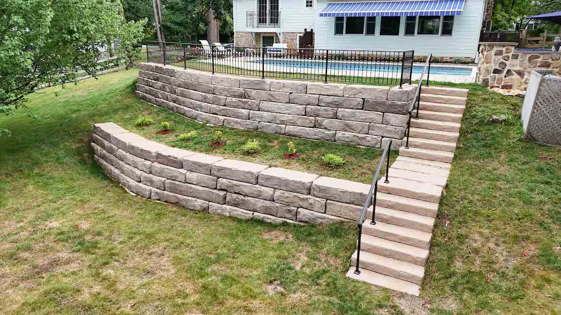 Retaining Wall Comparison: Grand Ledge vs. Timber — Which Is Right for Your Property? - BedRock Siteworks