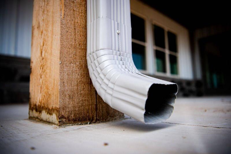 Sick of Looking At That Ugly Downspout? Here's How To Make It Blend In Beautifully - ManMadeDIY