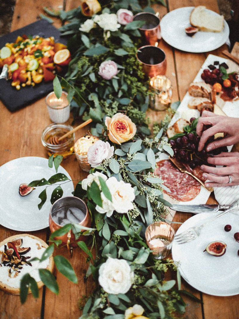 Thanksgiving Tablescape Ideas: Use greenery such as eucalyptus or myrtle along the center of your table use as many or as few mini pumpkins as you'd like. / theanastasiaco.com - The Anastasia