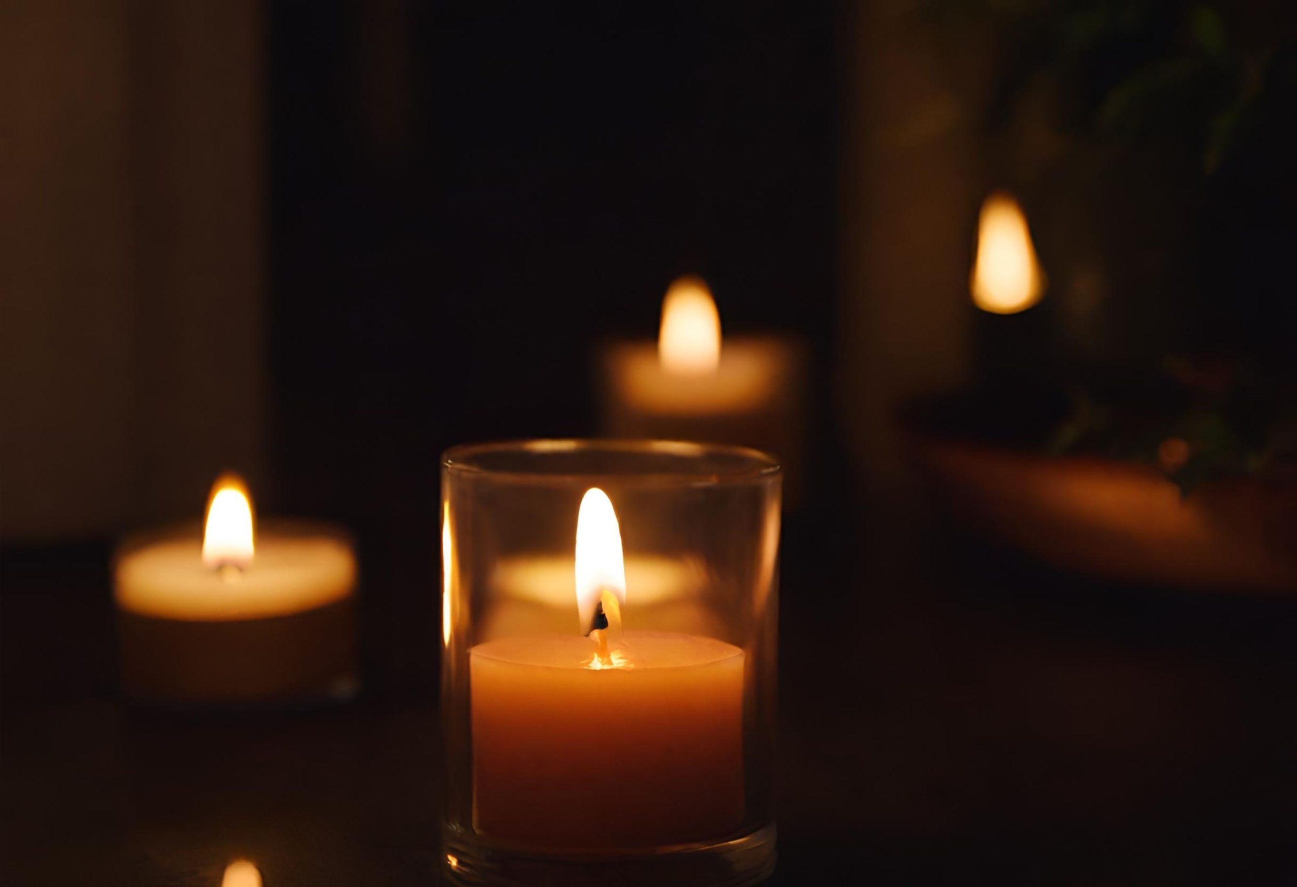 Warm candlelight creates a serene, spiritual ambiance, perfect for reflection and relaxation.