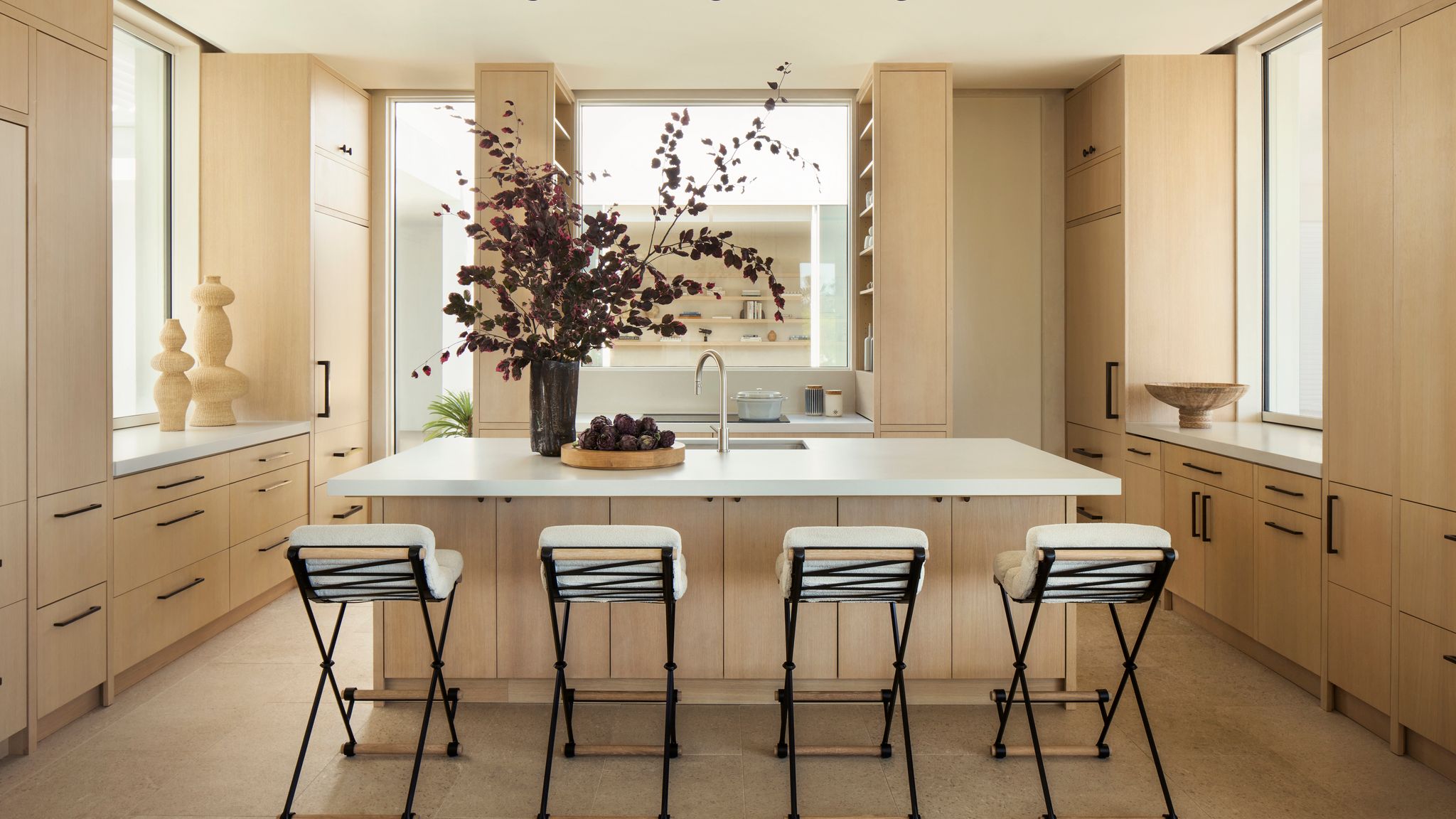 Warm minimalism reigns in an elegant home by a father and daughter design duo | House & Garden