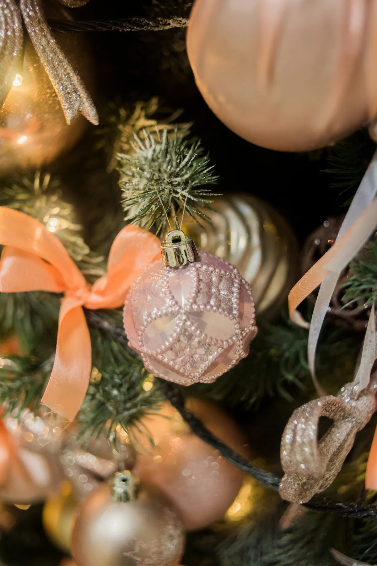 a close up of a christmas tree with ornaments