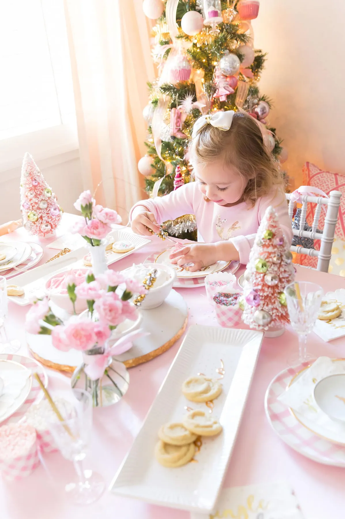 A Sparkling Pink Christmas Cookie Decorating Party - Pizzazzerie
