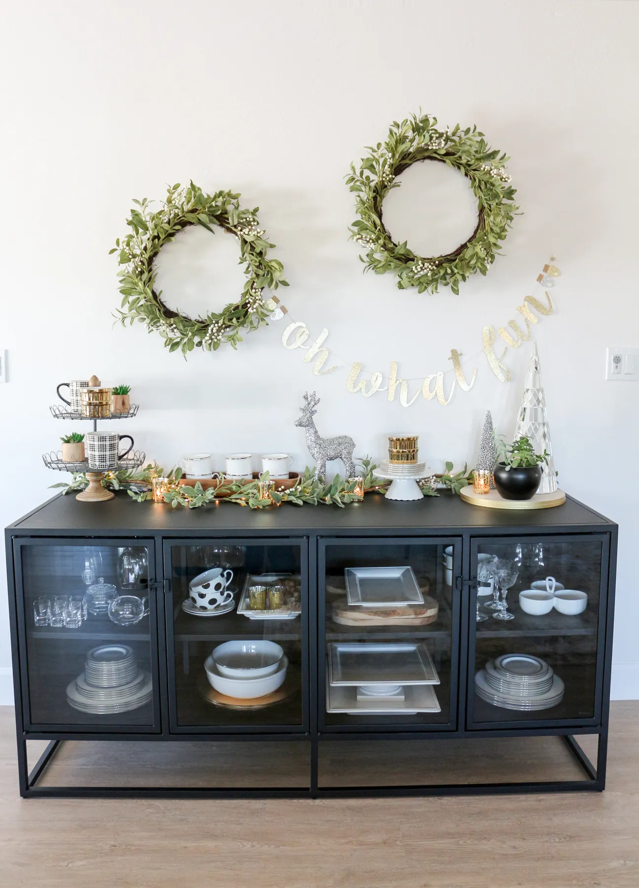 Black Sideboard Decorated Gold, White and Green for Christmas