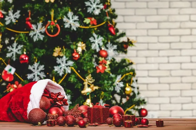 Close up shot of red decorative items star sphere present gift boxes pouring from christmas hat