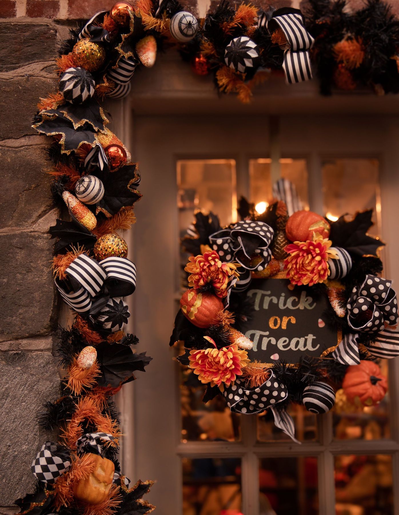 Colorful Halloween wreath with Trick or Treat sign on a door in Washington, DC.