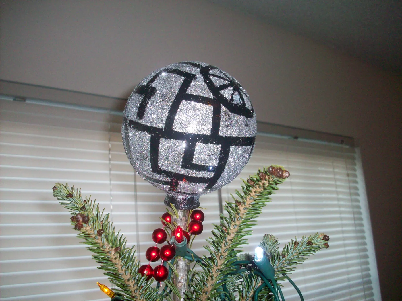 DIY glittery Death Star holiday tree topper • Offbeat Home & Life