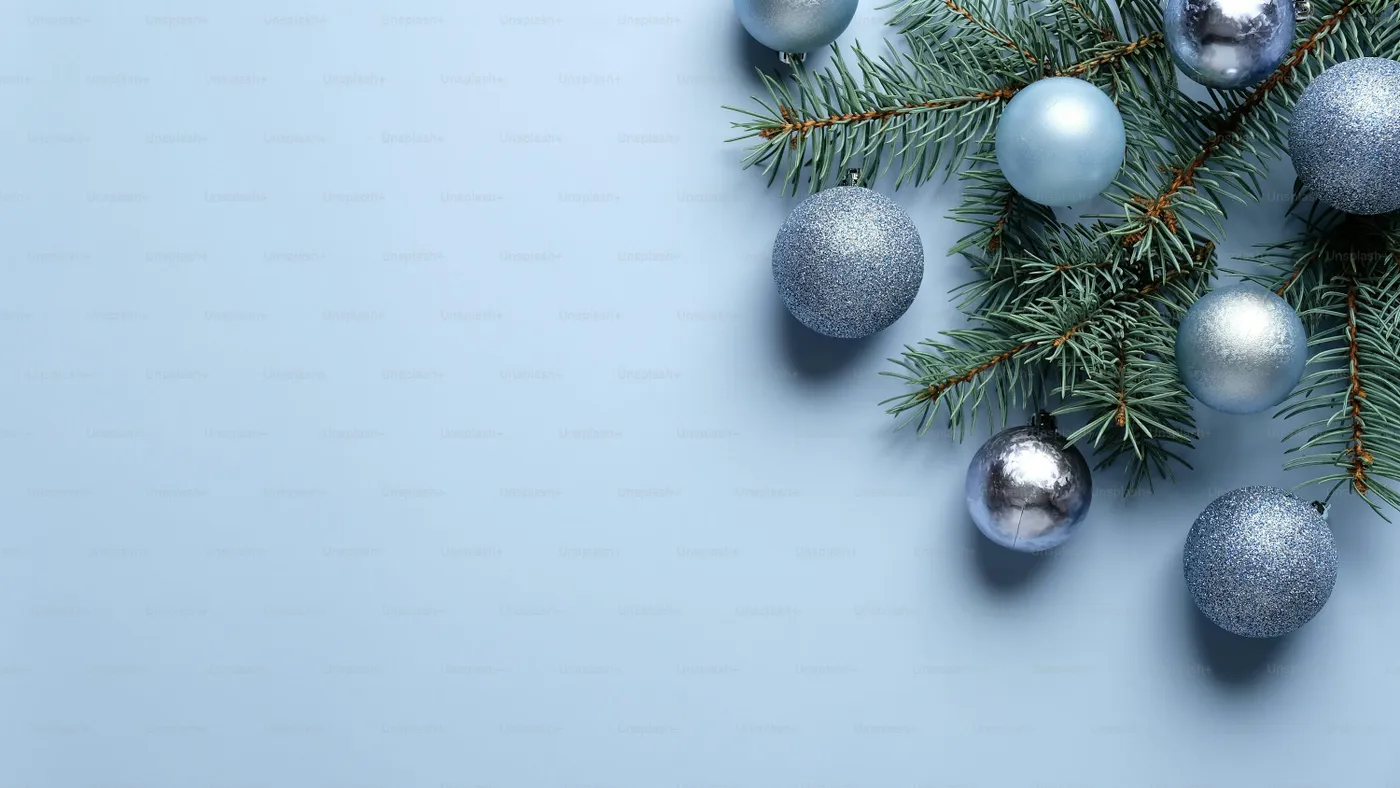 Elegant Christmas composition with blue and silver balls decoration and  pine tree branch on pastel blue background. Flat lay, top view - Photo on  Unsplash+