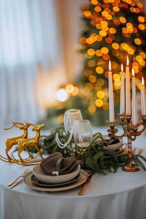 Elegant Holiday Table Setting with Candlelight · Free Stock Photo