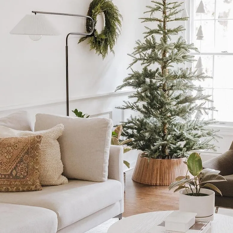 Forget Tree Skirts — These Christmas Tree Collars Are Functional And Festive