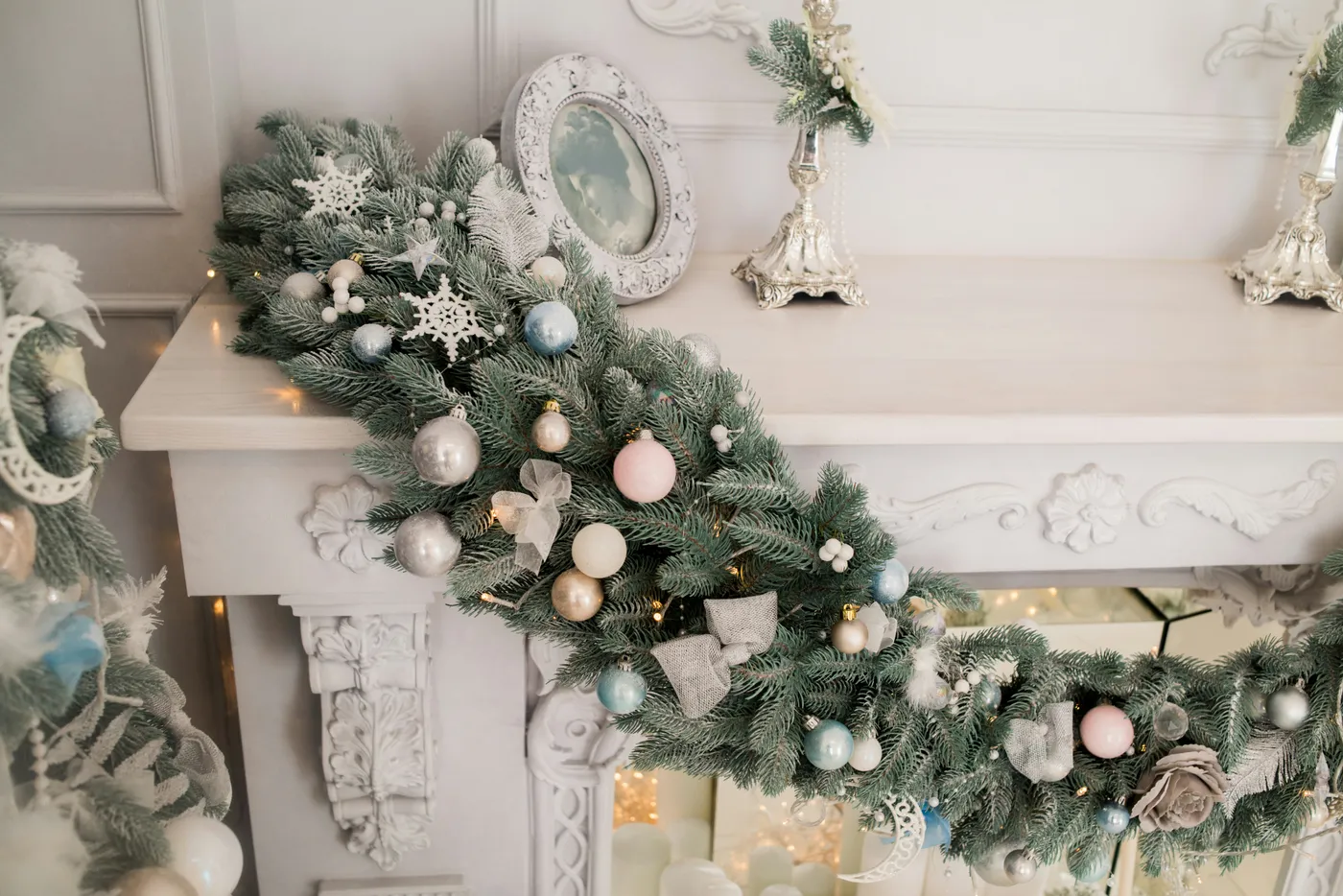 green Christmas tree beside white wall