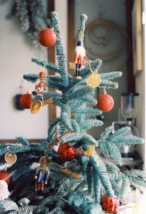 Hanging Ornaments on a Christmas Tree · Free Stock Photo