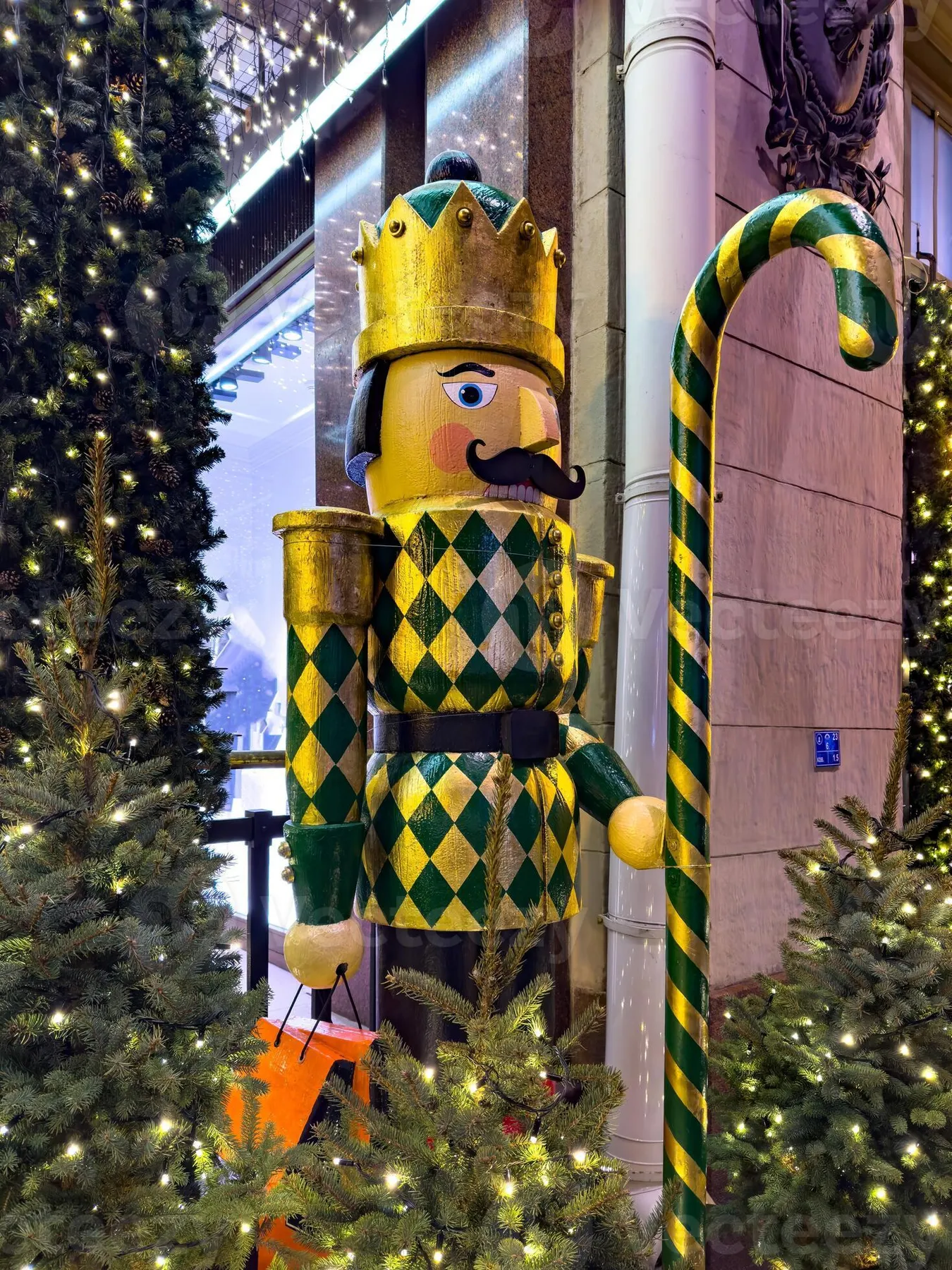 Harlequin Nutcracker Tree Ornaments A Decorative Christmas Nutcracker Soldier Dressed In A Gold And Green Harlequin