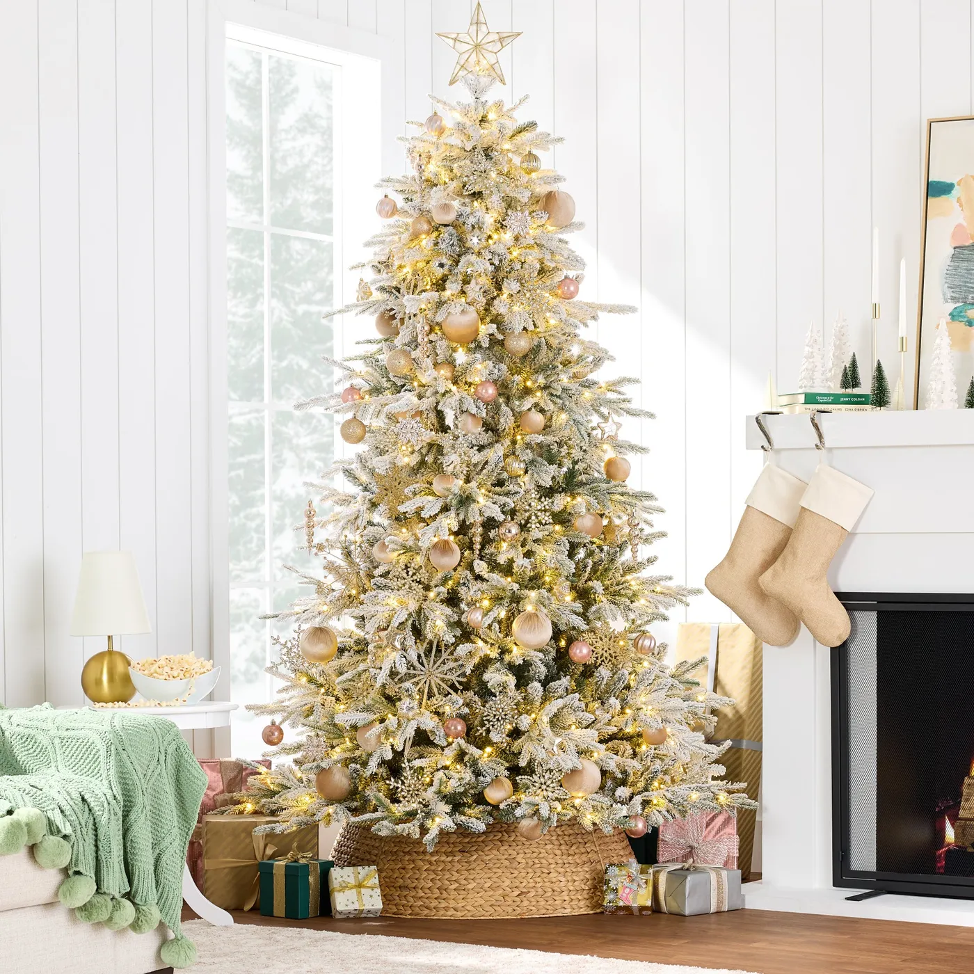 Pre-Lit Flocked Full Aspen Christmas Tree w/ 2-in-1 Glowing Aldik White flocked Christmas Tree Built In LED lights With Ornaments In This Picture