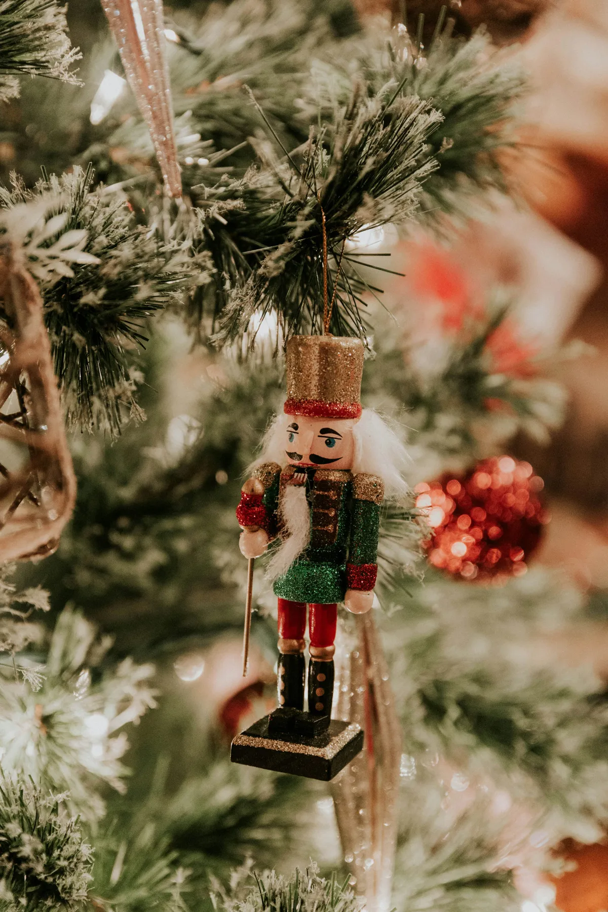 Red, brown, and green nutcracker Christmas tree decor - Free Photo on Unsplash
