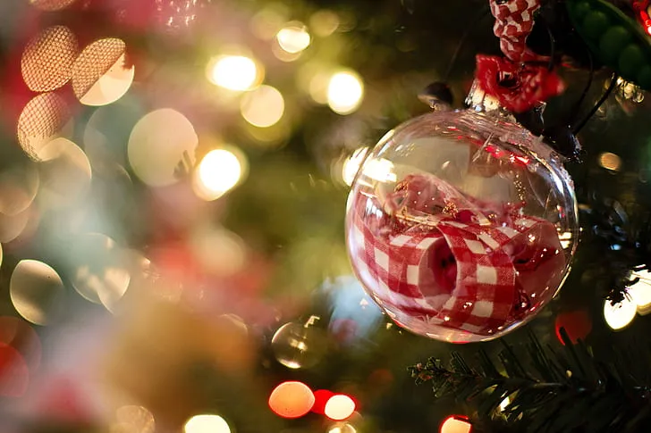 Royalty-Free photo: Clear glass bauble with red ribbon | PickPik