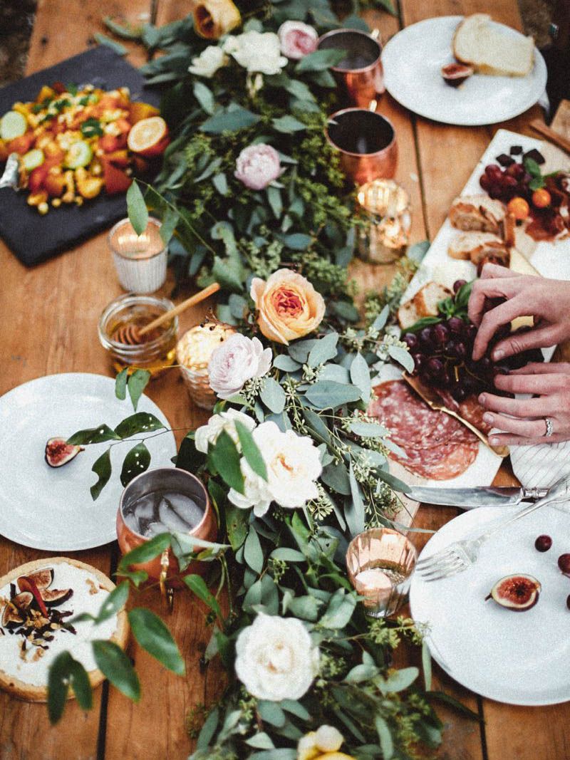 Thanksgiving Tablescape Ideas: Use greenery such as eucalyptus or myrtle along the center of your table use as many or as few mini pumpkins as you'd like. / theanastasiaco.com - The Anastasia