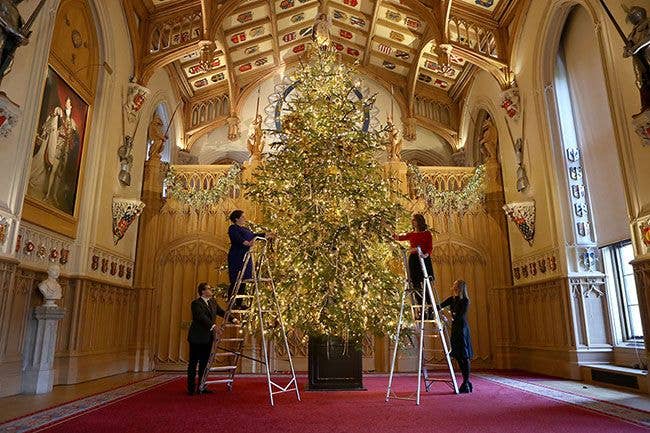 The Queen puts up incredible 20ft gold Christmas tree at Windsor Castle