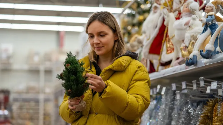 This Clever Hack Makes Budget-Friendly Dollar Store Christmas Trees Look Full And Luxurious