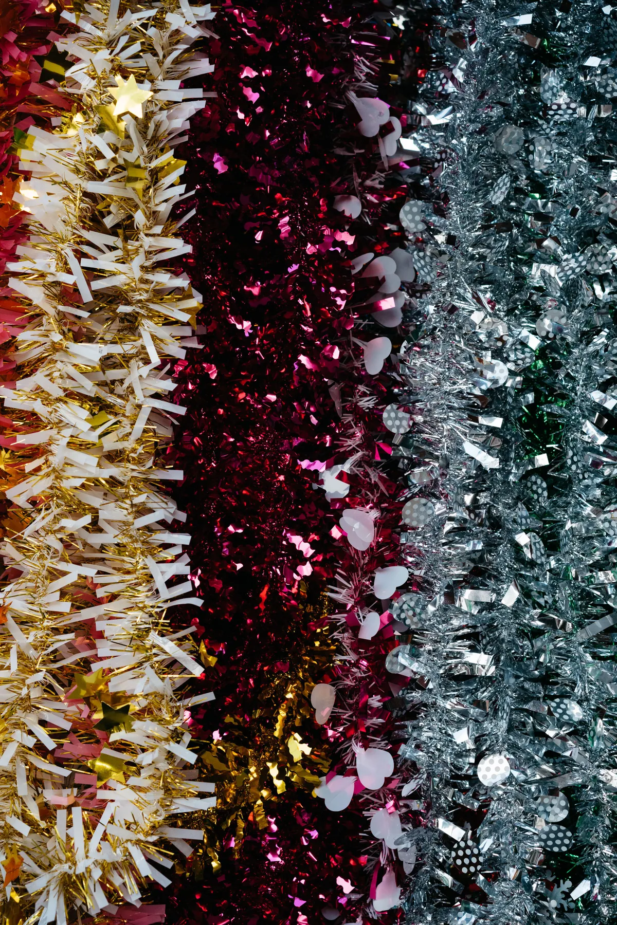 Vibrant and shiny colorful tinsel ornaments perfect for festive celebrations, observed in Bangkok.